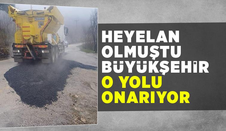 Boztepe'de heyelanda zarar gören yol onarılıyor