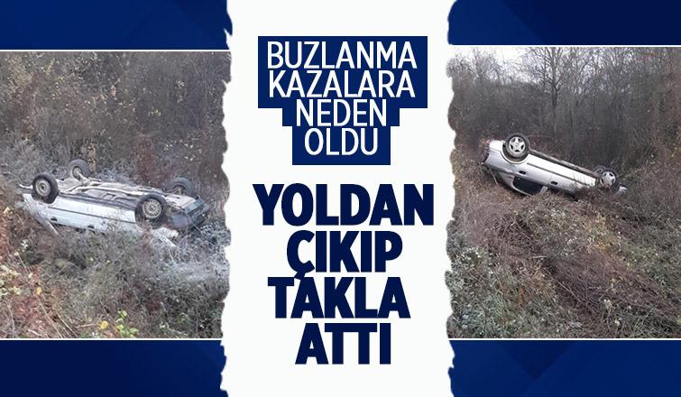 Buzlanan yolda kayıp takla attı  