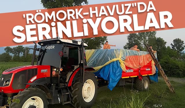 Traktör römorkunda serinliyorlar