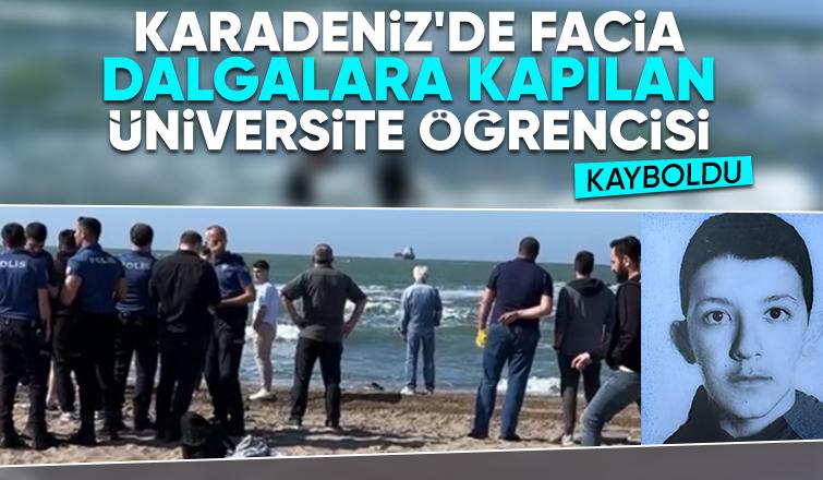 Karasu'da denize giren üç üniversite öğrencisinden biri dalgalara kapılarak kayboldu.