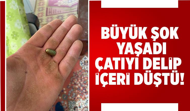 Yorgun mermi çatıyı delip odaya düştü