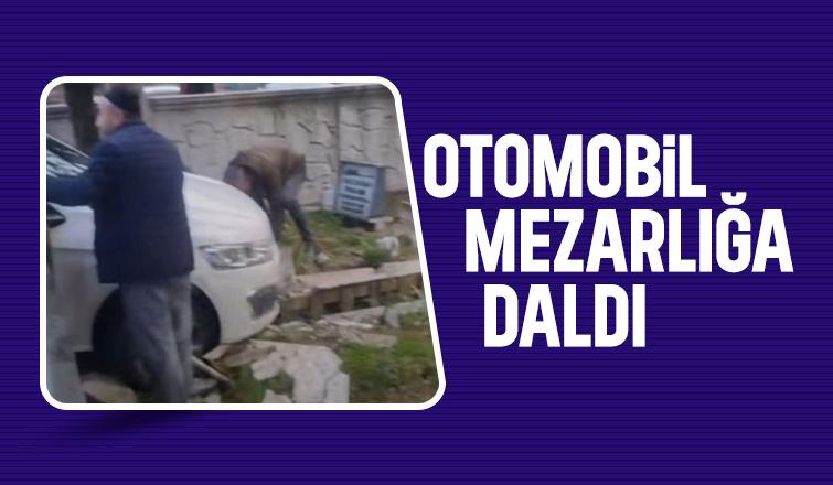 Otomobil ile mezarlığa girdi