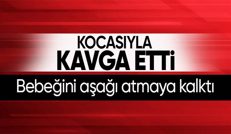 Bebeğini aşağı atmaya kalktı