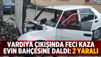 Otomobil evin bahçesine daldı: 2 yaralı