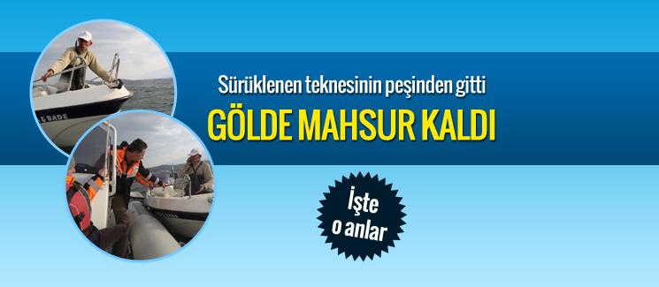 Göle sürüklenen teknesini kurtarmak isterken mahsur kaldı